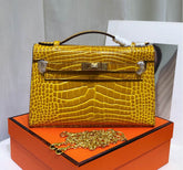 Hermes Kelly Pochette Jaune Ambre Shiny Niloticus Crocodile Leather Palladium Hardware Women Clutch Bag