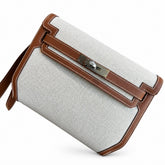 Hermès Kelly Depeches 25 clutch, canvas and swift leather (with additional shoulder strap), can be carried cross-body, can be carried by hand or on the wrist, daily needs, seamless switching between business