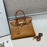 Hermès Birkin Gold Tan Togo Leather 25cm Togo calfskin leather Gold accessories